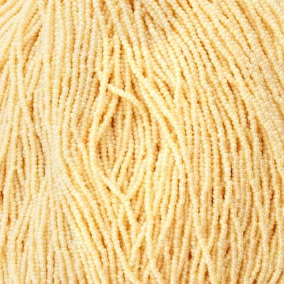 Czech Seed Bead 11/0 Opaque Pearl Ivory Strung image