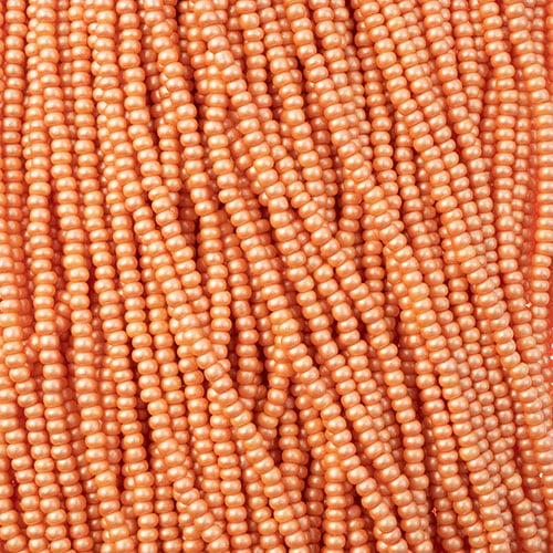 Czech Seed Beads 11/0 PermaLux Dyed Chalk Apricot Strung image
