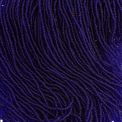 Czech Seed Bead 13/0 Cut Transparent Dark Royal Blue Strung image