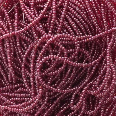 Czech Seed Bead 13/0 Cut Transparent Red Luster Strung image