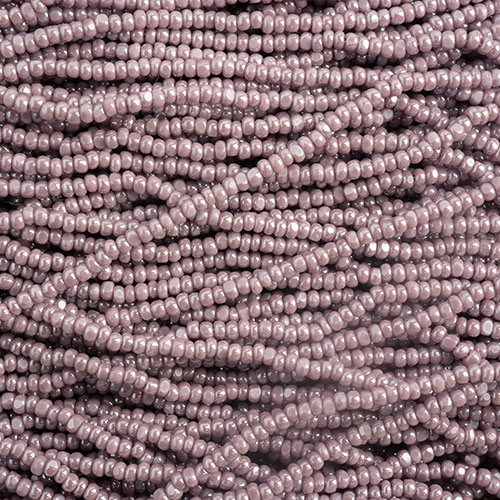 Czech Seed Bead 13/0 Cut Opaque Mauve Luster Strung image