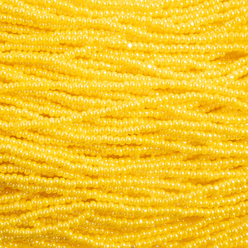 Czech Seed Bead 13/0 Cut Yellow Luster Strung image