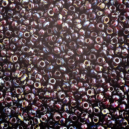 Miyuki Seed Bead 11/0 Tr. Ruby Picasso image